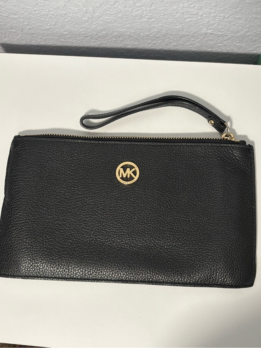 Michael Kors Black Pebbled Leather Wristlet with Gold MK Emblem